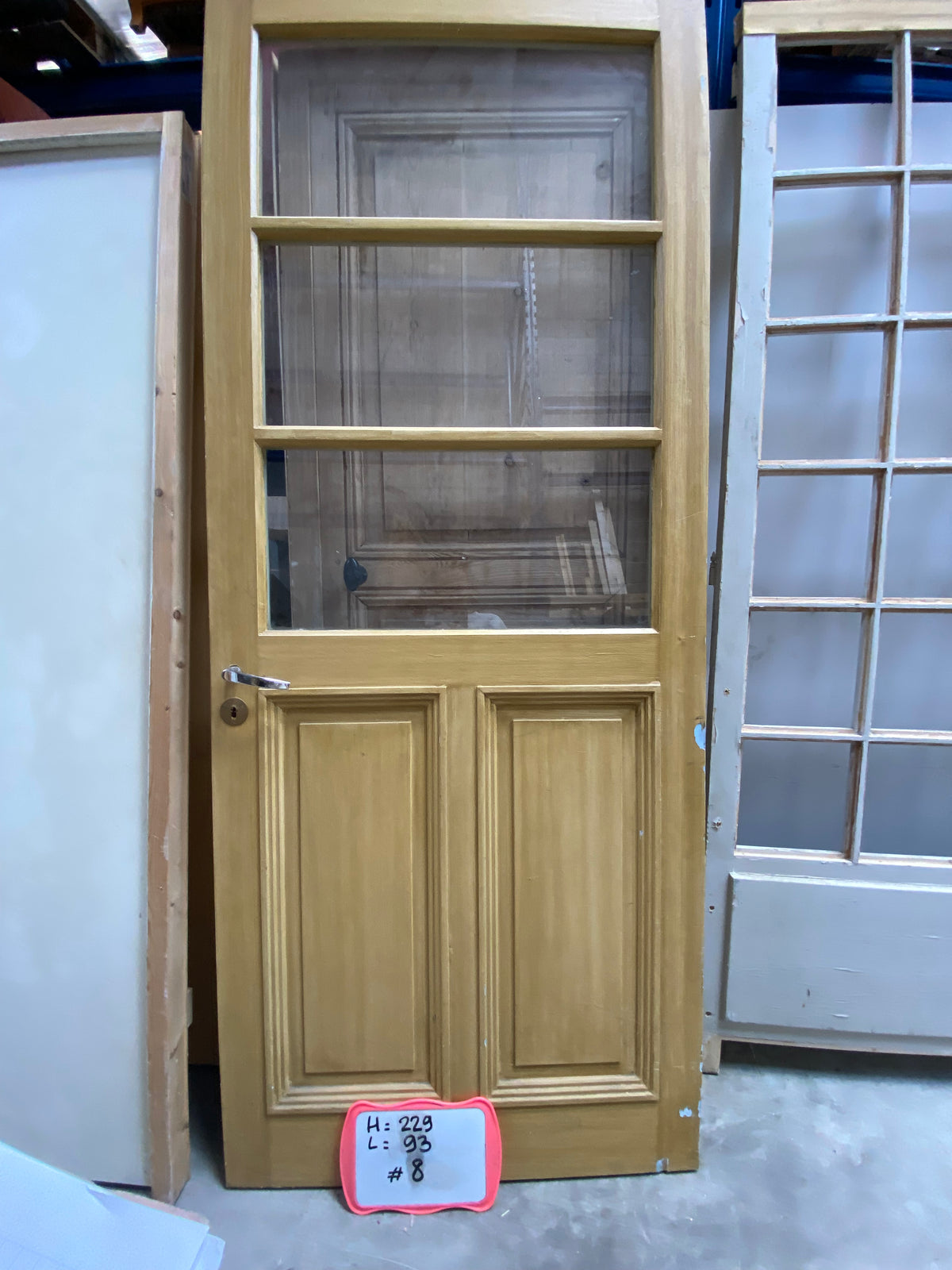 Porte en bois vitrée