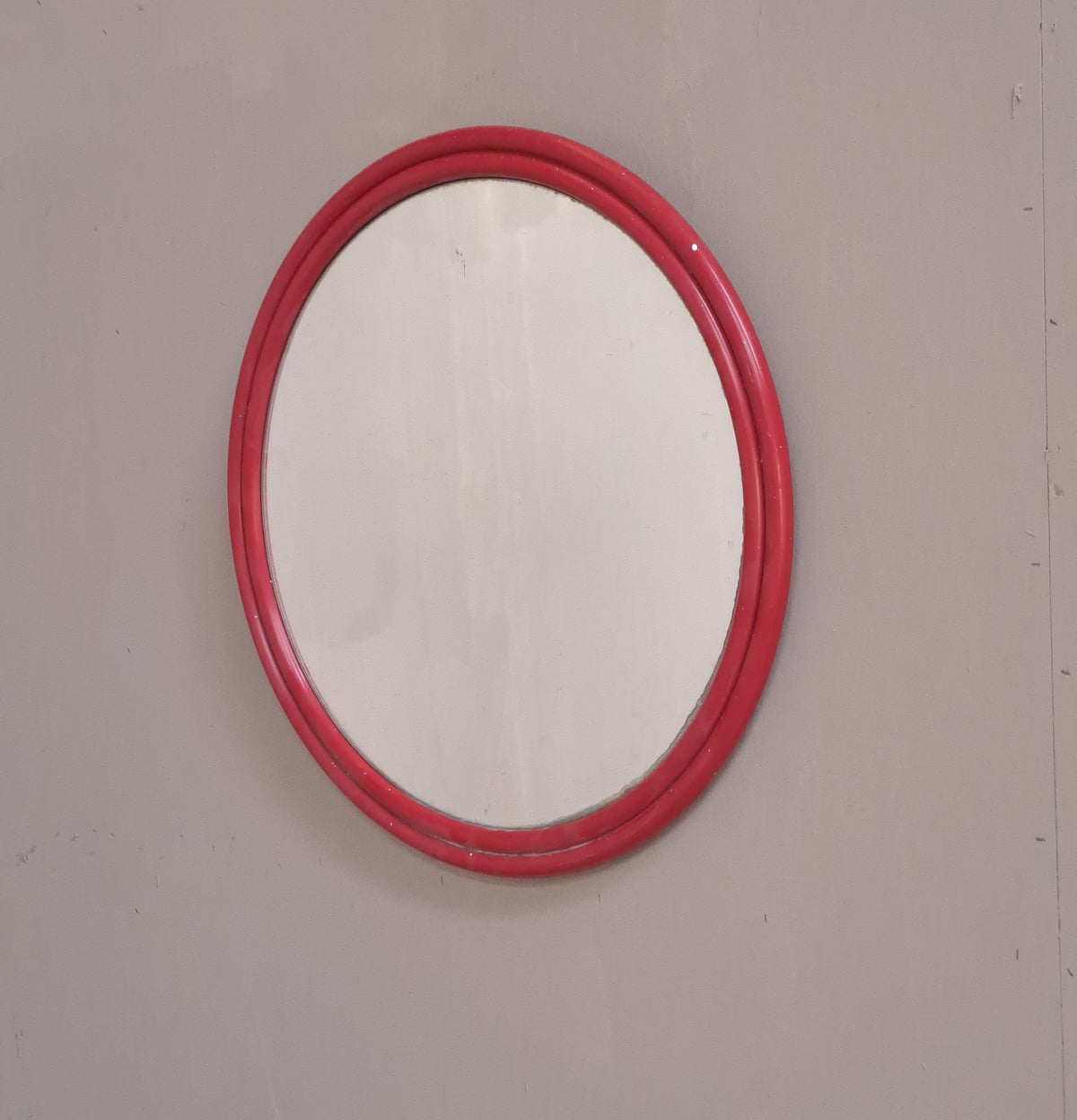 Miroir rond à cadre rouge en plastique