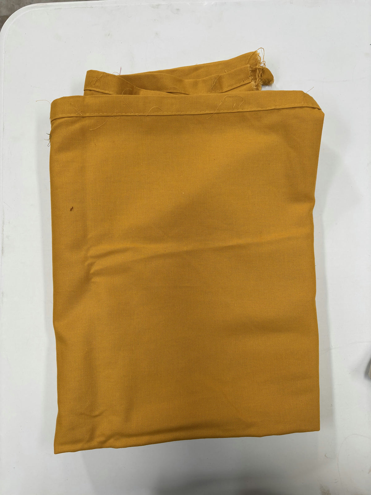 Tissu jaune moutarde