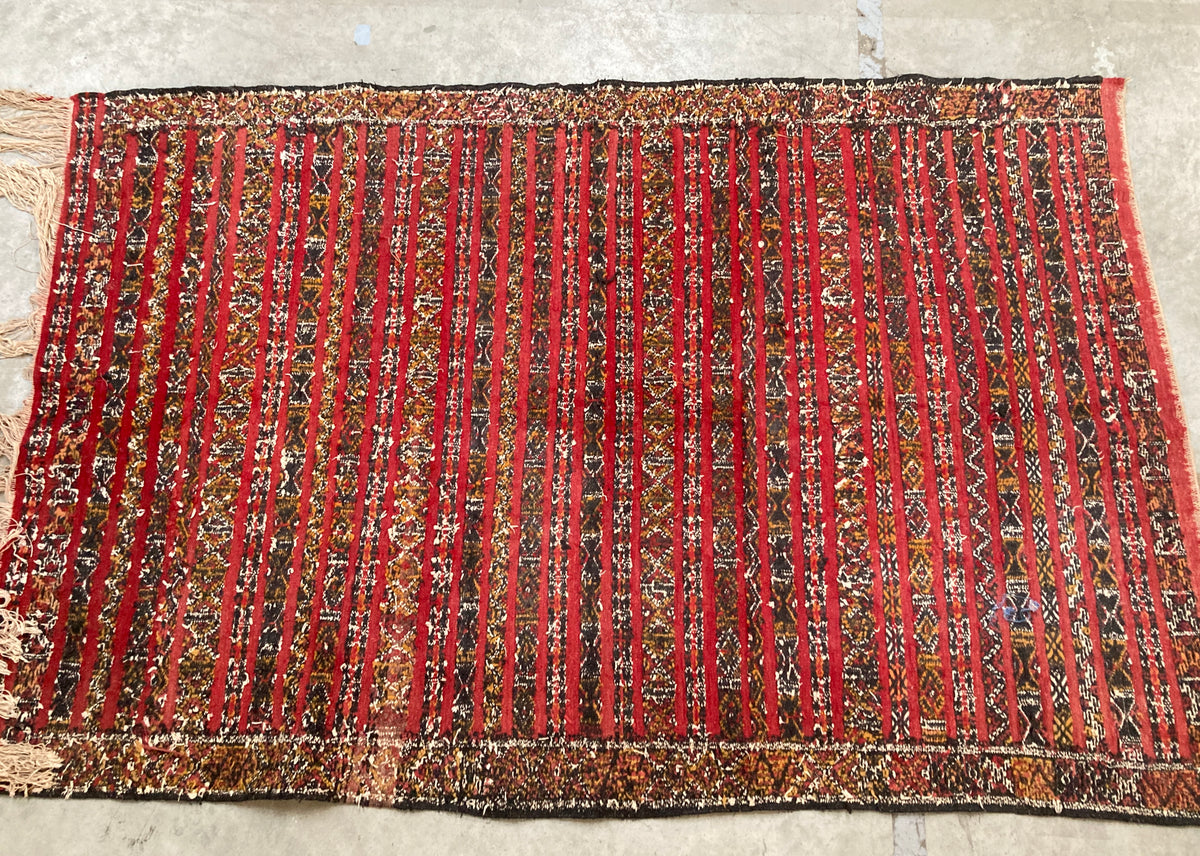 Tapis oriental rouge