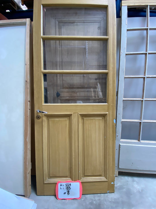 Porte en bois vitrée