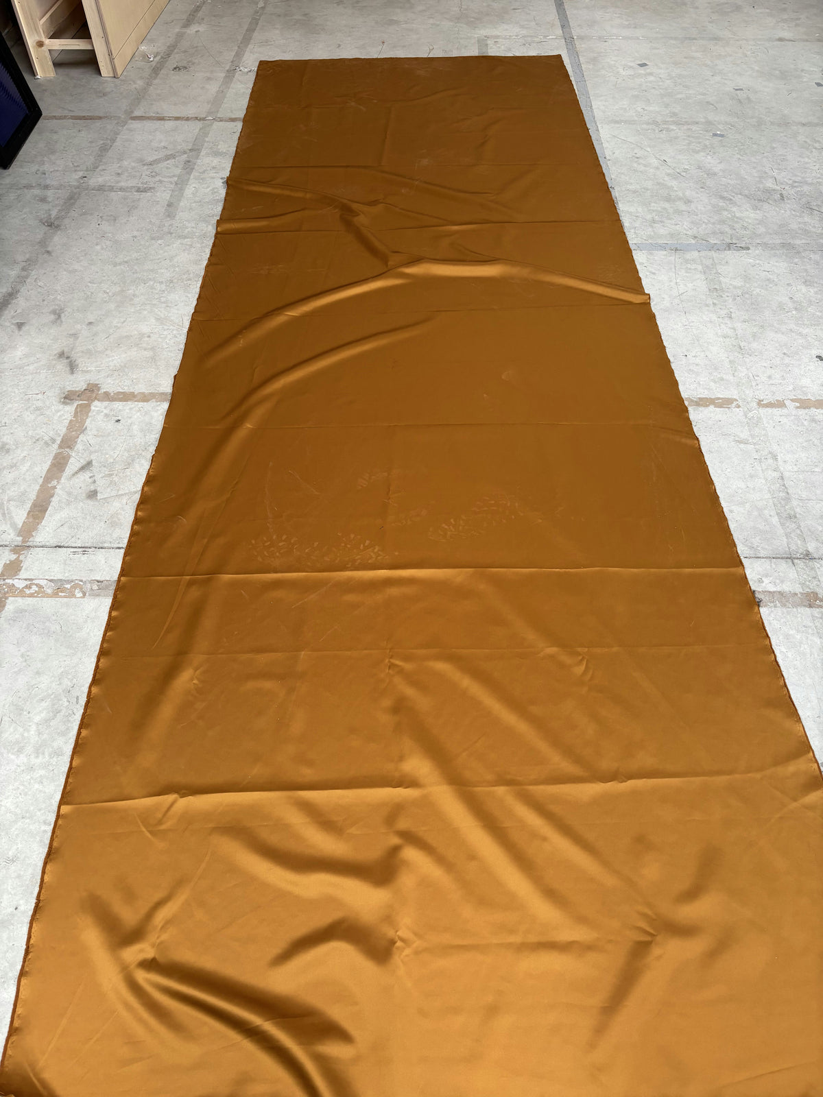 Tissu jaune/orangé brillant