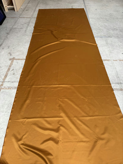 Tissu jaune/orangé brillant