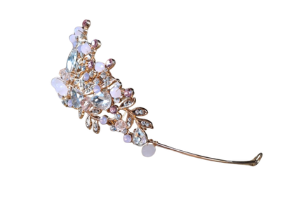 Diadème rose et doré orné de strass et de perles