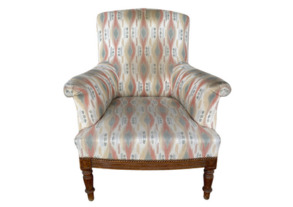 Fauteuil en tissu à motifs sur pieds tournés (H 90 cm)