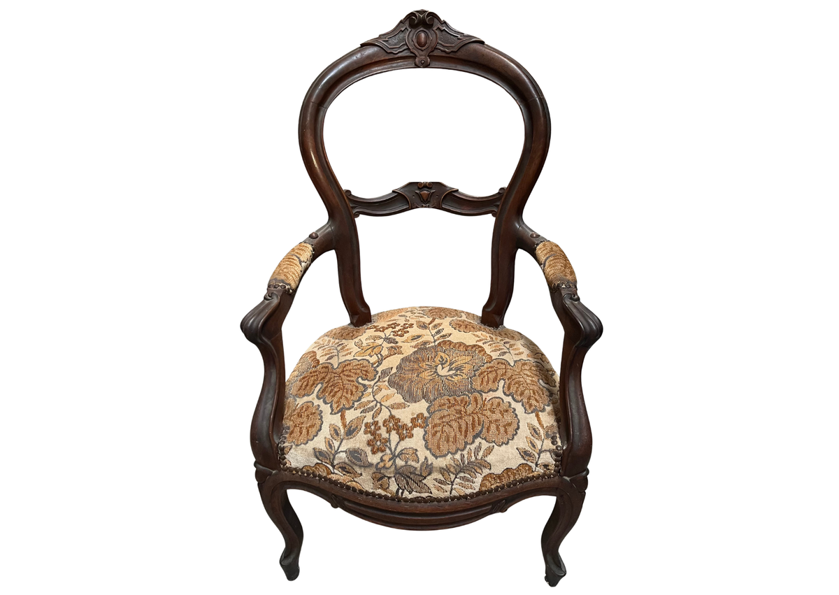Fauteuil de style Louis-Philippe en bois et tissu à fleurs