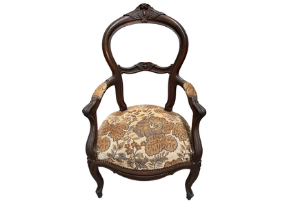 Fauteuil de style Louis-Philippe en bois et tissu à fleurs