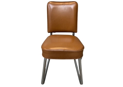 Chaise en cuir marron sur piètement luge chromé