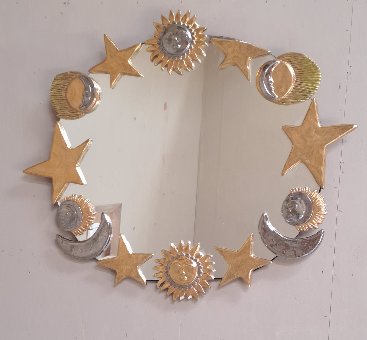 Miroir en céramique émaillée dorée et argenté