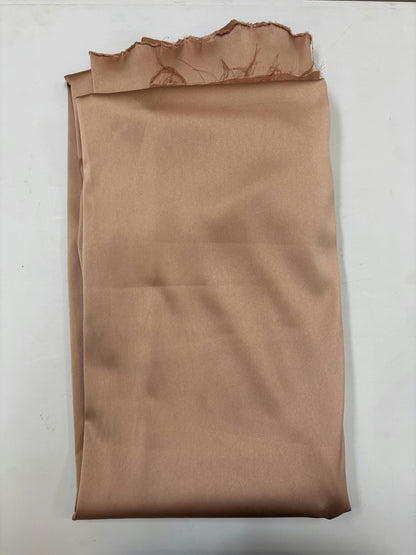 Tissu rose pâle satiné