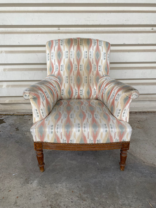 Fauteuil de salon ancien à motif