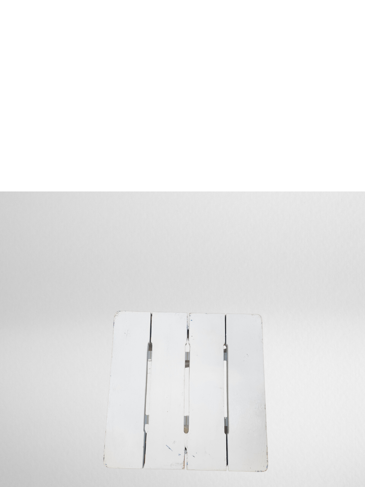 Tabouret blanc pliable