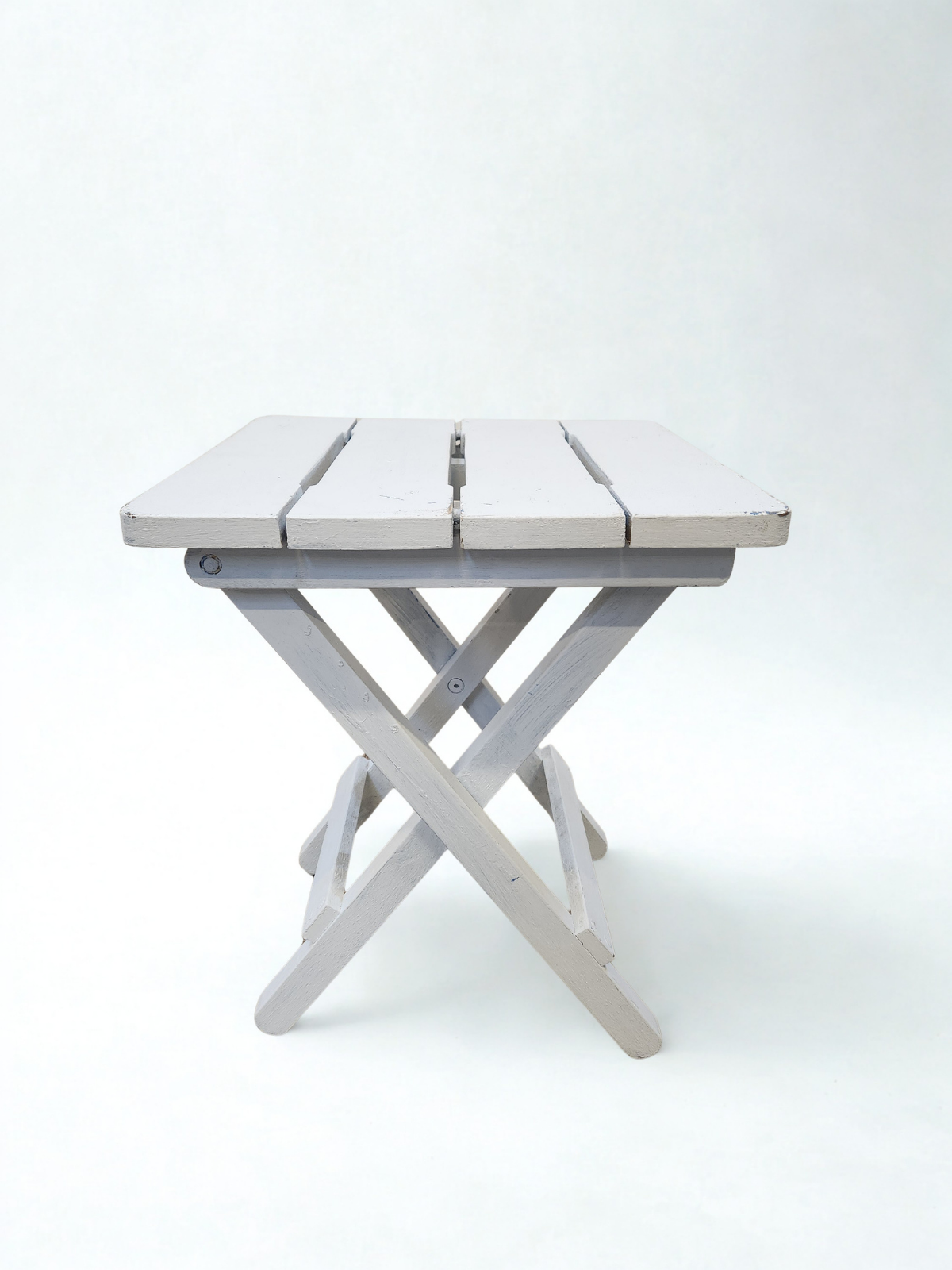 Tabouret blanc pliable