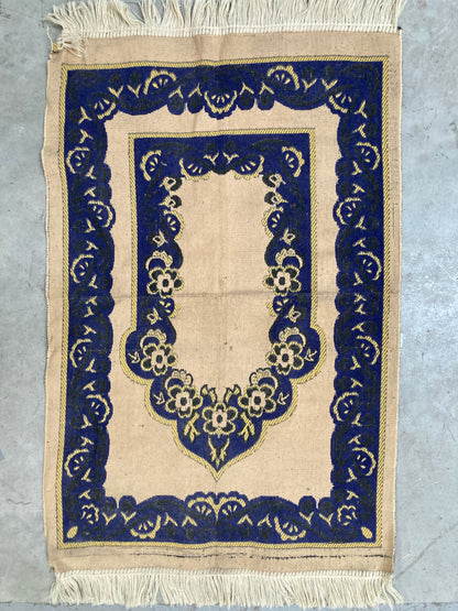 Tapis oriental bleu et beige