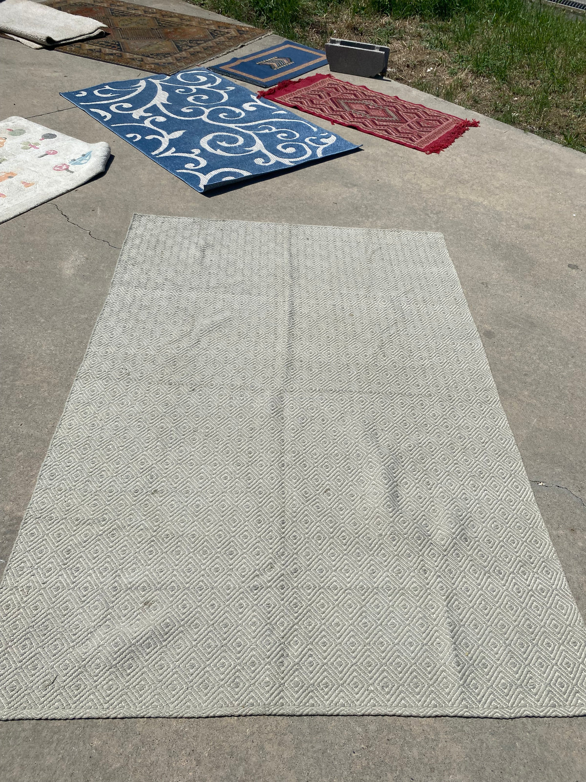 Grand tapis blanc