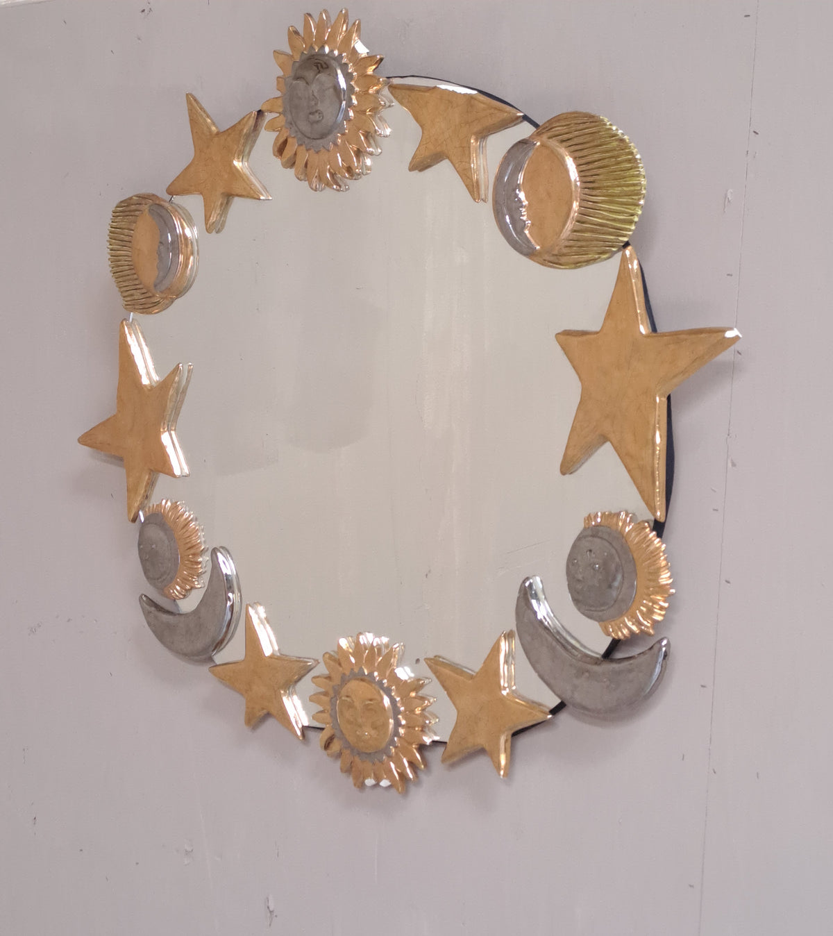 Miroir en céramique émaillée dorée et argenté