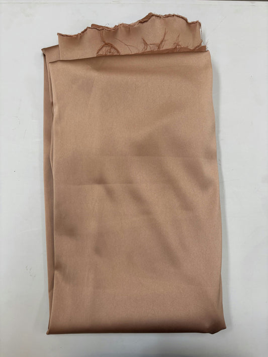 Tissu rose pâle satiné